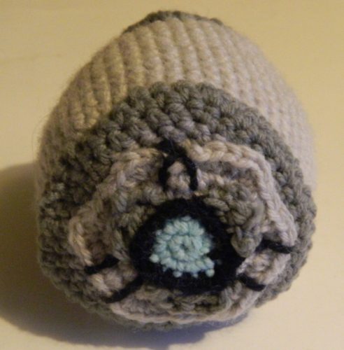 A partially complete crochet Rocket League ball
