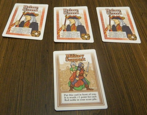 Point scoring action card in Guillotine.