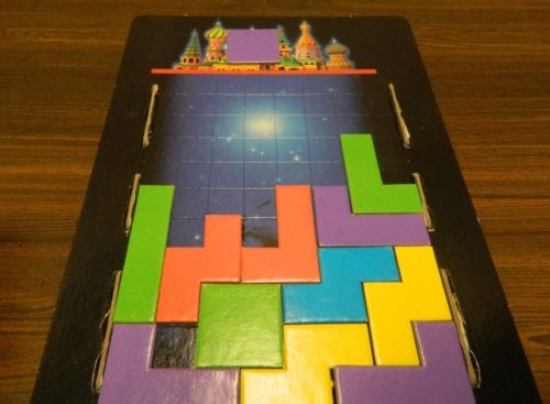 Giving a Block in the Tetris Board Game