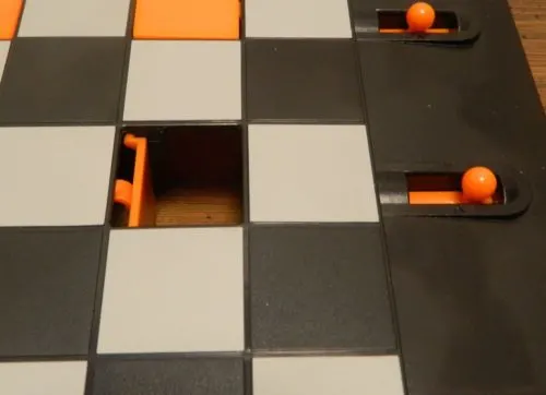 Pulling Knob in Trapdoor Checkers