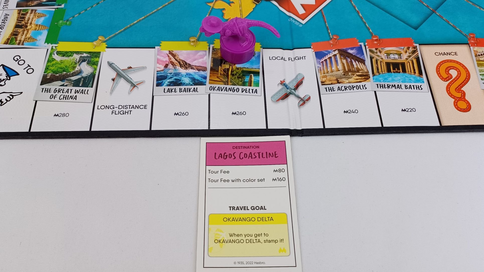 Complete Travel Goal in Monopoly Travel World Tour
