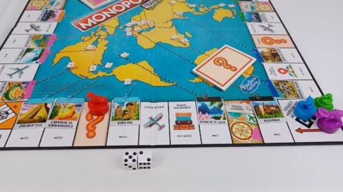 monopoly travel world tour como se juega