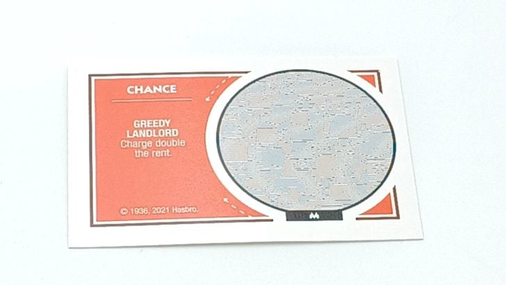 Using A Chance Card in Monopoly Crooked Cash