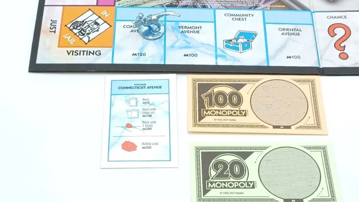 Purchasing A Title Deed in Monopoly Crooked Cash