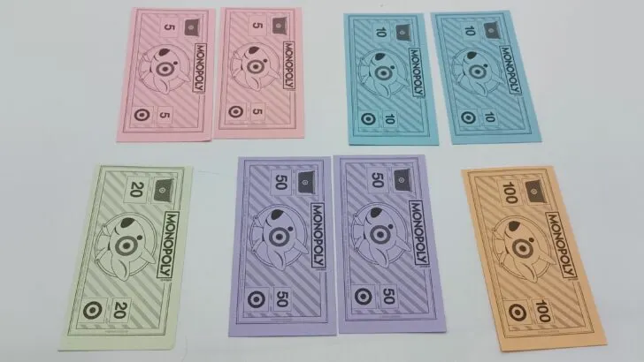 Players' starting money consisting of two M5, two M10, one M20, two M50, and one M100.