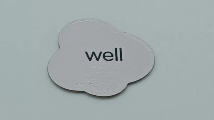 A word card featuring the word "well".