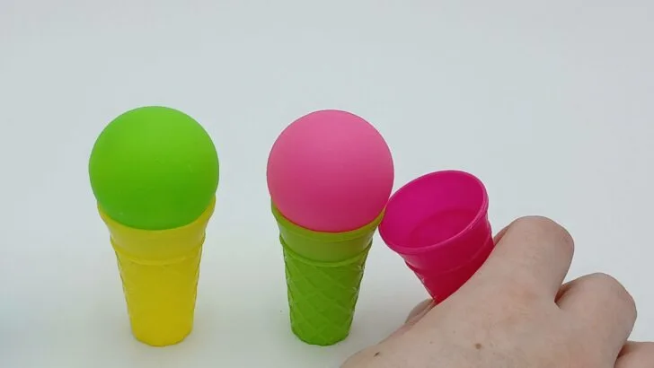 The player is now moving the red scoop of ice cream to the green cone.