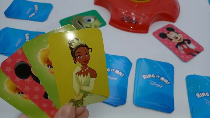 This picture shows the last remaining Tiana card the player needs. Unfortunately, it's in one of their other piles so they will have to take a few steps to get it into the correct pile.