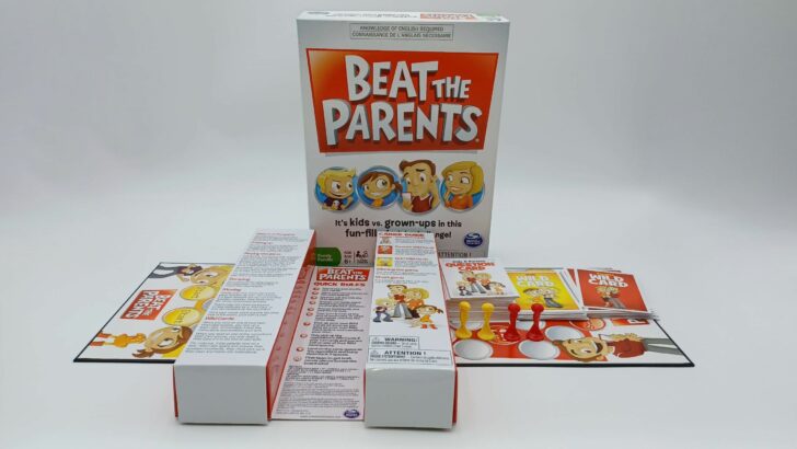 A picture of all of the components included in Beat the Parents including the box, a long game board, the rules (which are printed on the box insert), three stacks of cards, two yellow movers, and two red movers.