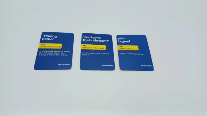 This picture shows the backs of the cards pictured in the previous image. The correct answers were "Finding Nemo," "Can I Go to the Bathroom?," and "John Legend."