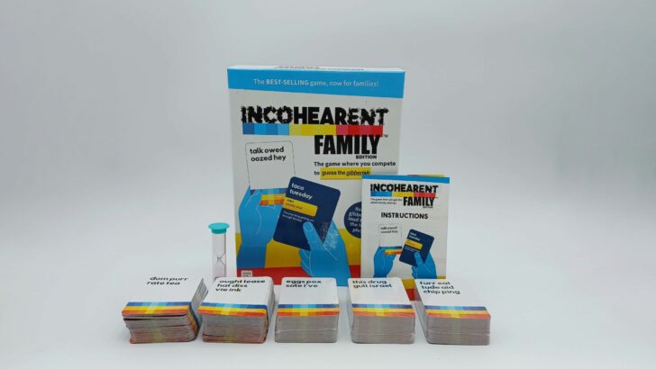 This picture shows all of the components included in Incohearent: Family Edition, including the box, a sand timer, the instructions, and five stacks of 100 cards each.