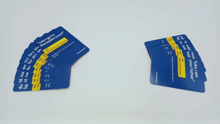 This picture shows a team play game where the left team earned eight cards at the end of the game. The team on the right only has five cards so the left team is the winner.