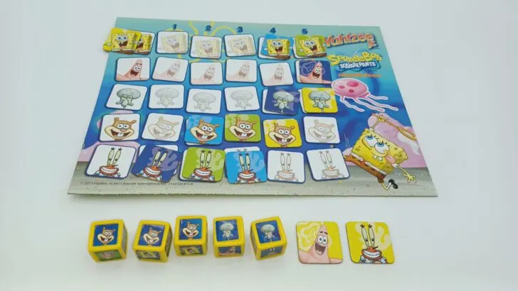 The yellow player only has SpongeBob, Patrick, and Mr. Krabs tokens left to score. Unfortunately, all three of their dice rolls fail to produce any of those characters. They will have to play one of their tokens (they chose SpongeBob) on the "zero space."