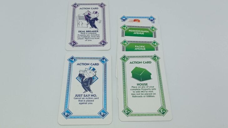 A player using a Just Say No card to block a Deal Breaker card played by another player. 