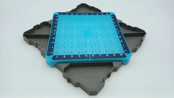 Inserting the grid into the storage trays