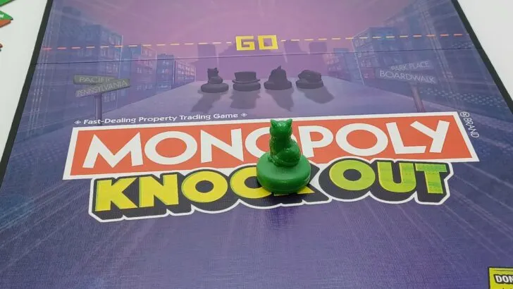 Sliding your Monopoly Knockout piece