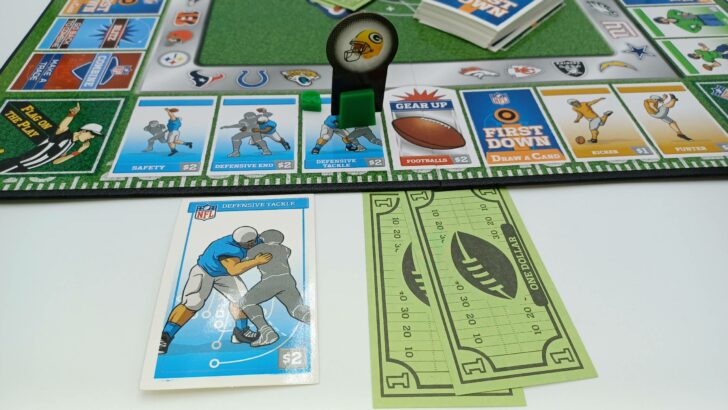 Acquiring an NFL space in NFL-Opoly Junior