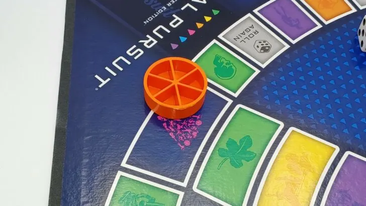 Landing on a pink wedge space in Trivial Pursuit Master Edition